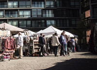 Philadelphia residents attend the Brooklyn Flea Philly at the Piazza