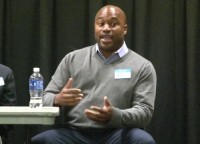 A journalist speaking at the summit