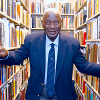 Charles Blockson in the stacks at Paley Library