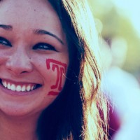 Image of Temple student with her face painted