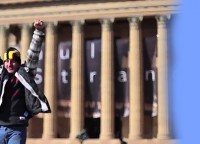 Man at the top of the Art Museum steps