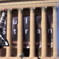 Man at the top of the Art Museum steps