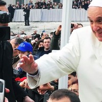 Pope Francis greeting onlookers